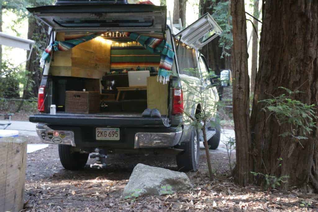 image of open truck bed with small office inside